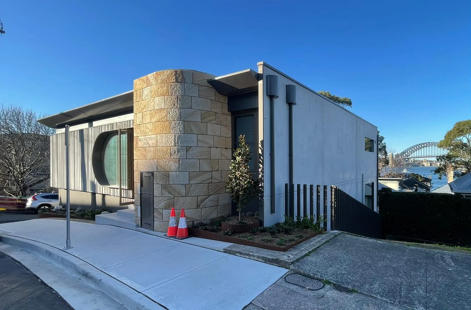 Exterior repaint, rendered corner home with sandstone tower, Sydney